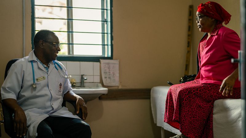 Dr. Yohana Mokiwa and Mary Mwinqira, a patient living with diabetes, meet for a consultation, Dar es Salaam, Tanzania